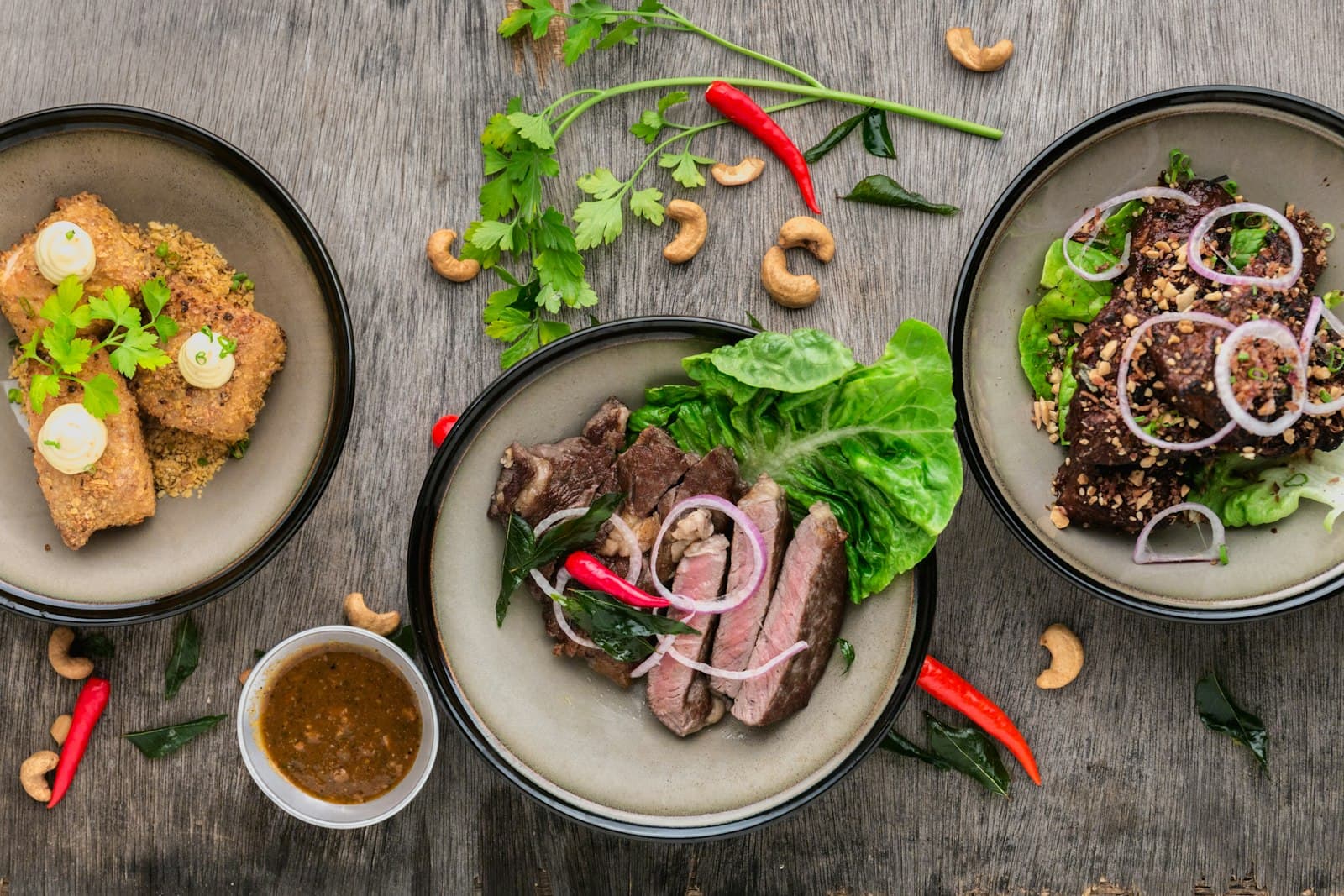 A beautifully plated dish on a restaurant table with warm ambient lighting